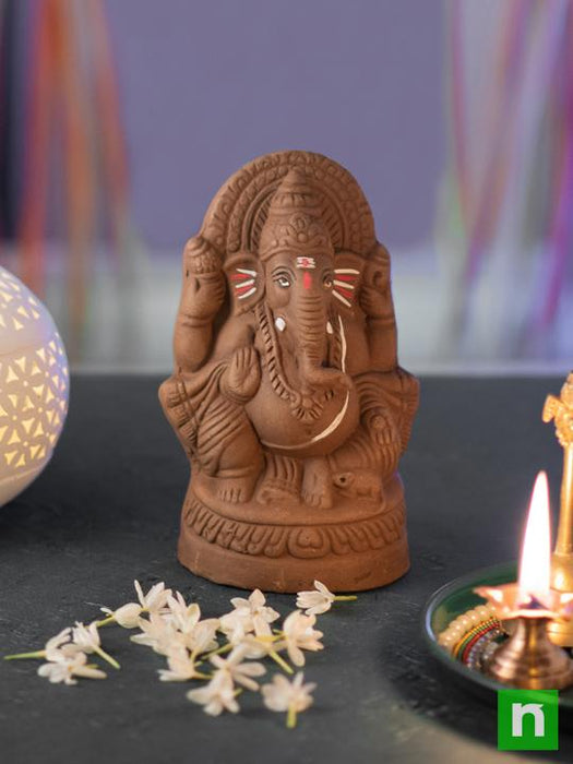 eco - friendly ganesha with oxygen enriching indoor garden